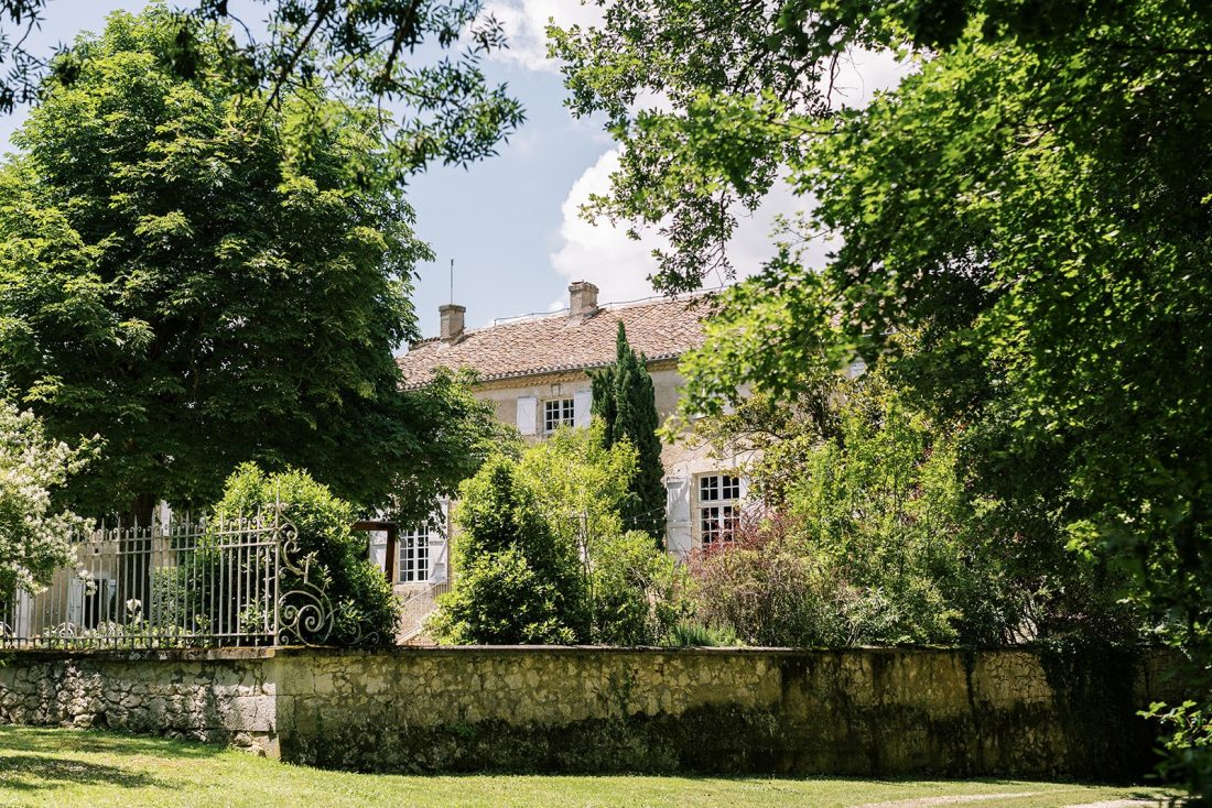 The first sight of Chateau de Lartigolle as you arrive in the main entrance with the majestic chestnut trees towering over the the walled courtyard.